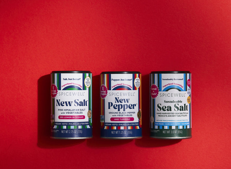 New Salt, New Pepper and Sea Salt Mini Shakers on a red background